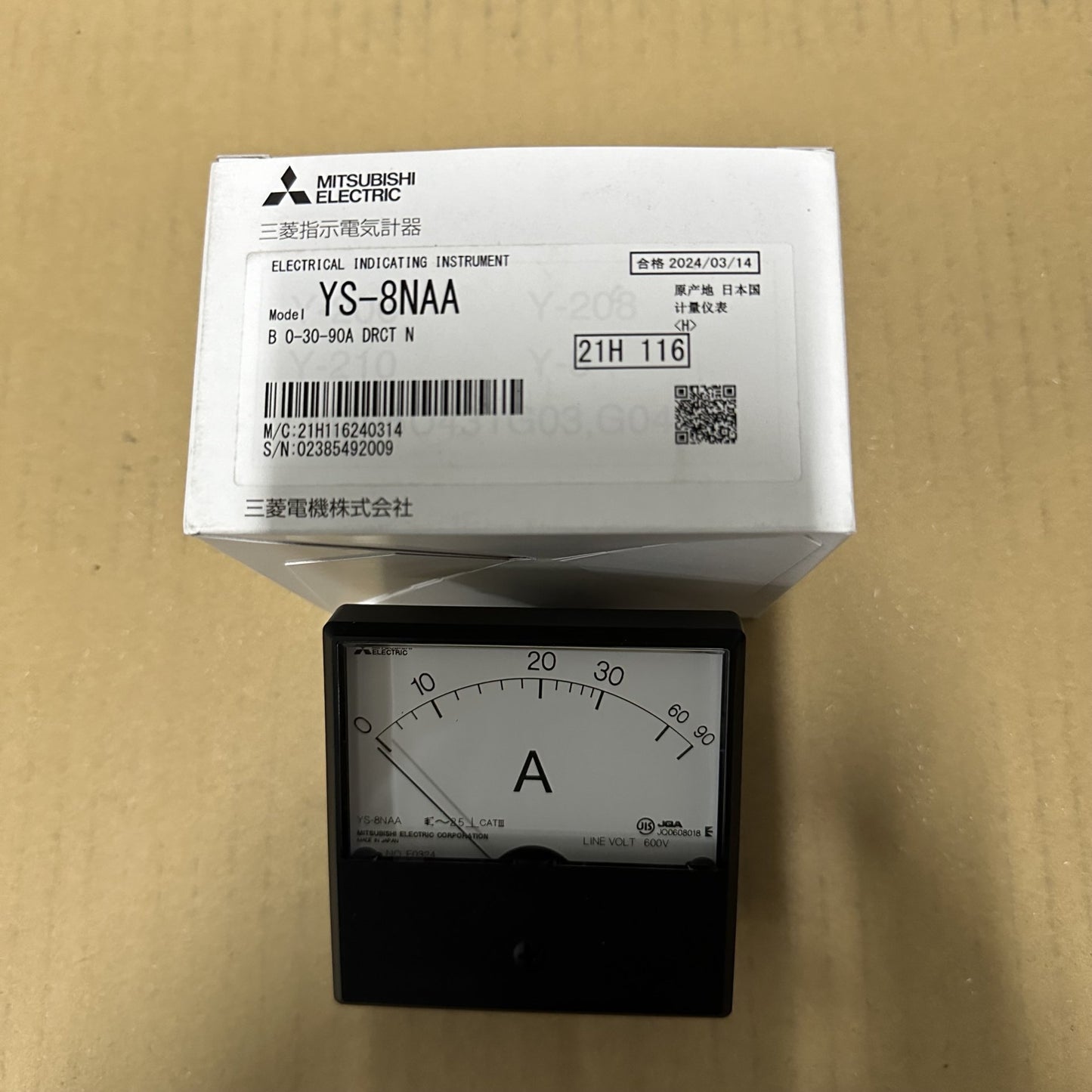 Mitsubishi Electric electrical instrument packaging on a cardboard background
