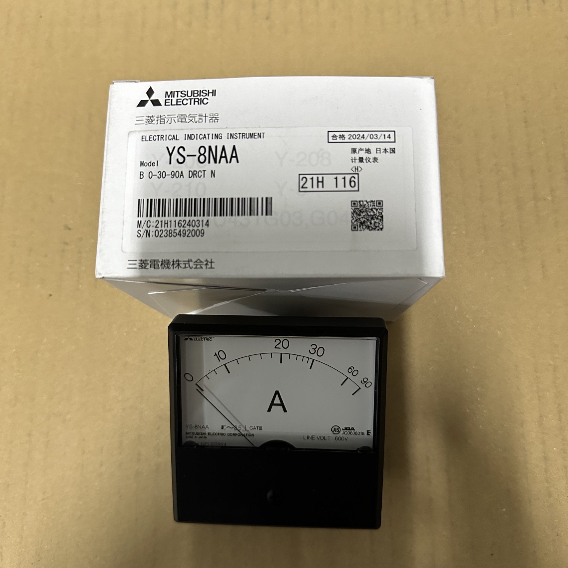 Mitsubishi Electric electrical instrument packaging on a cardboard background